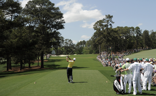 Tiger Woods tees off the 3rd at Augusta National in 2013