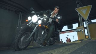 Frank Wet riding a motorbike in a screenshot from Dead Rising Deluxe Remaster