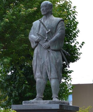 A statue of Tsukahara Bokuden (who lived 1489-1571), a famous samurai who supposedly wrote this newly translated book.