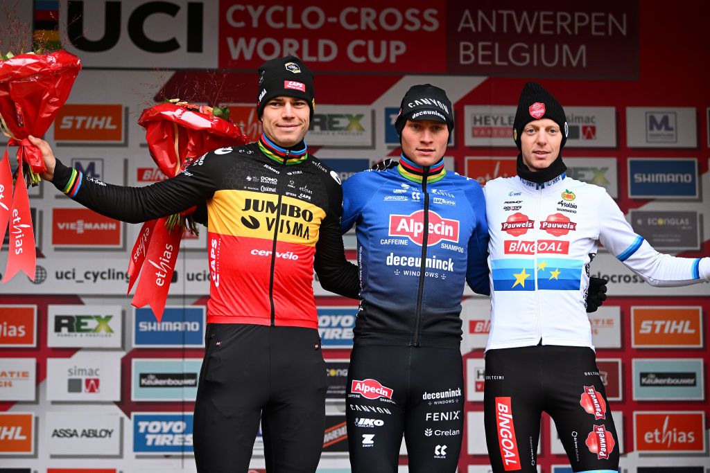 ANTWERPEN BELGIUM DECEMBER 04 LR Wout van Aert of Belgium and Team JumboVisma on second place race winner Mathieu van der Poel of The Netherlands and Team AlpecinDeceuninck and Michael Vanthourenhout of Belgium and Team Pauwels Sauzen Bingoal on third place pose on the podium ceremony after the 16th UCI Cyclocross World Cup Antwerpen 2022 Mens Elite CXWorldCup on December 04 2022 in Antwerpen Belgium Photo by Luc ClaessenGetty Images