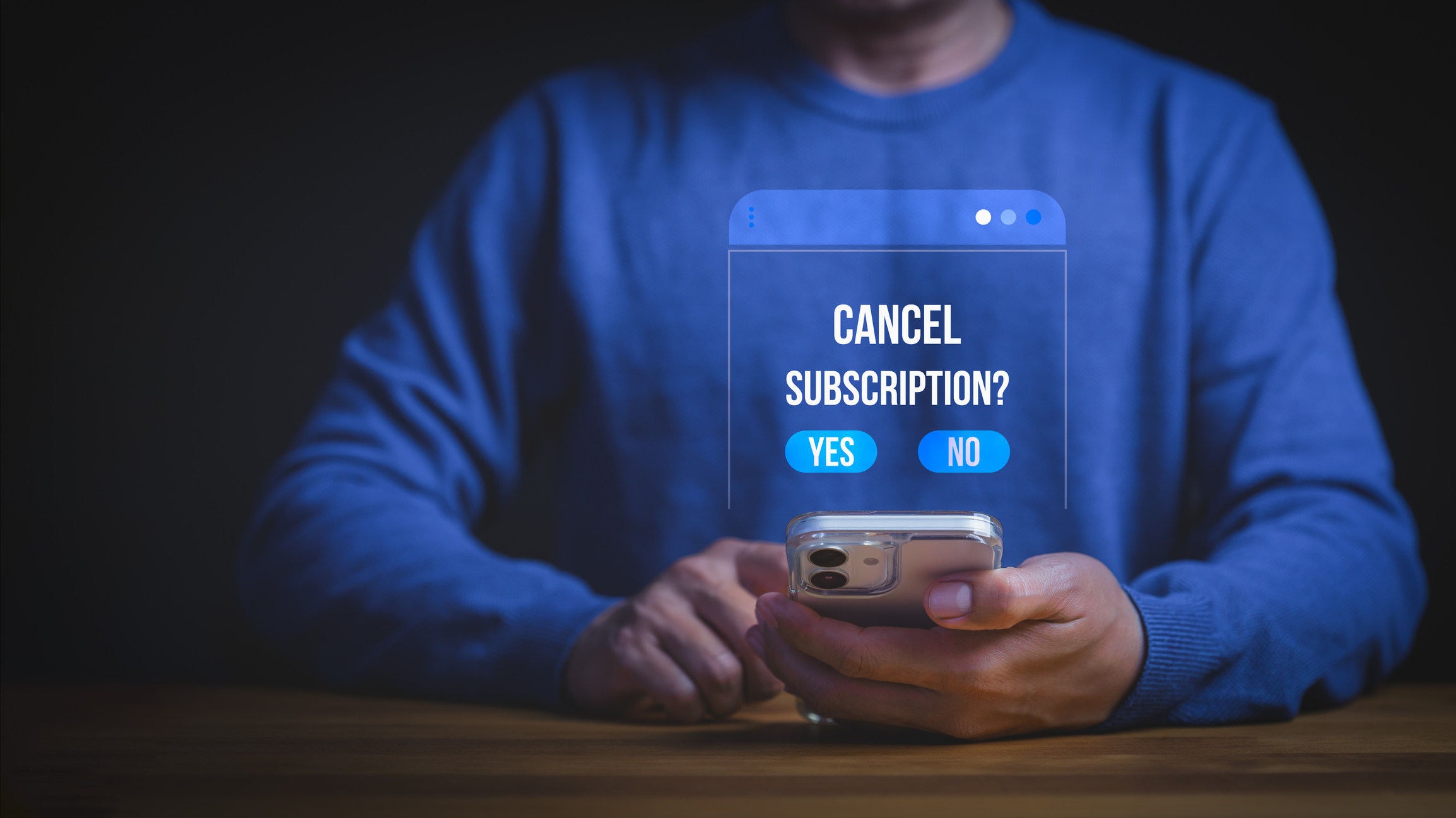 Man using smartphone to cancel subscription on digital app interface.