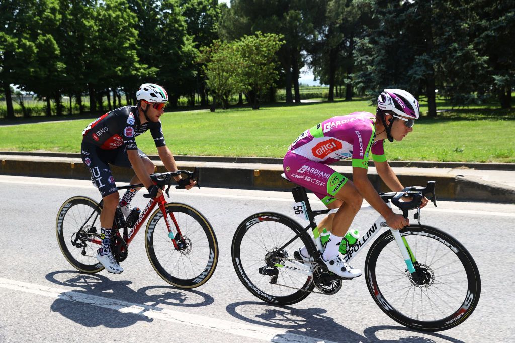 REGGIO EMILIA ITALY MAY 18 LR Filippo Tagliani of Italy and Team Drone Hopper Androni Giocattoli Sidermec and Luca Rastelli of Italy and Team Bardiani CSF Faizane compete in the breakaway during the 105th Giro dItalia 2022 Stage 11 a 203km stage from Santarcangelo di Romagna to Reggio Emilia Giro WorldTour on May 18 2022 in Reggio Emilia Italy Photo by Michael SteeleGetty Images