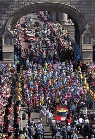 Riders line up on the Tower Bridge for the ceremonial start