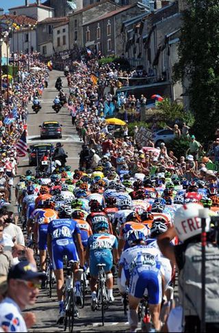 The peloton arrives at the day's final categorised climb.