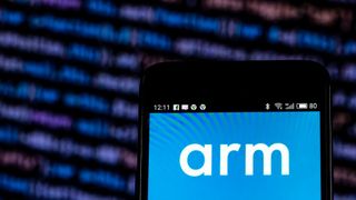 The Arm logo on a smartphone with lines of code in the background