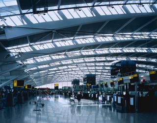 The check-in hall at the Rogers Stirk Harbour + Partners-designed Terminal 5 at London Heathrow Airport.