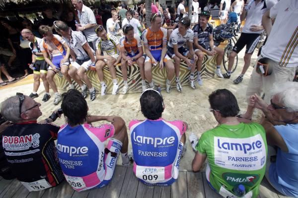 The riders await the start