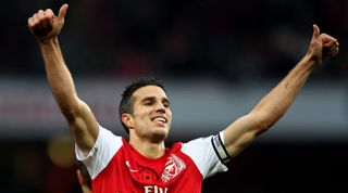 LONDON, ENGLAND - NOVEMBER 05: Robin van Persie of Arsenal celebrates after scoring the opening goal during the Barclays Premier League match between Arsenal and West Bromwich Albion at Emirates Stadium on November 5, 2011 in London, England. (Photo by Julian Finney/Getty Images)