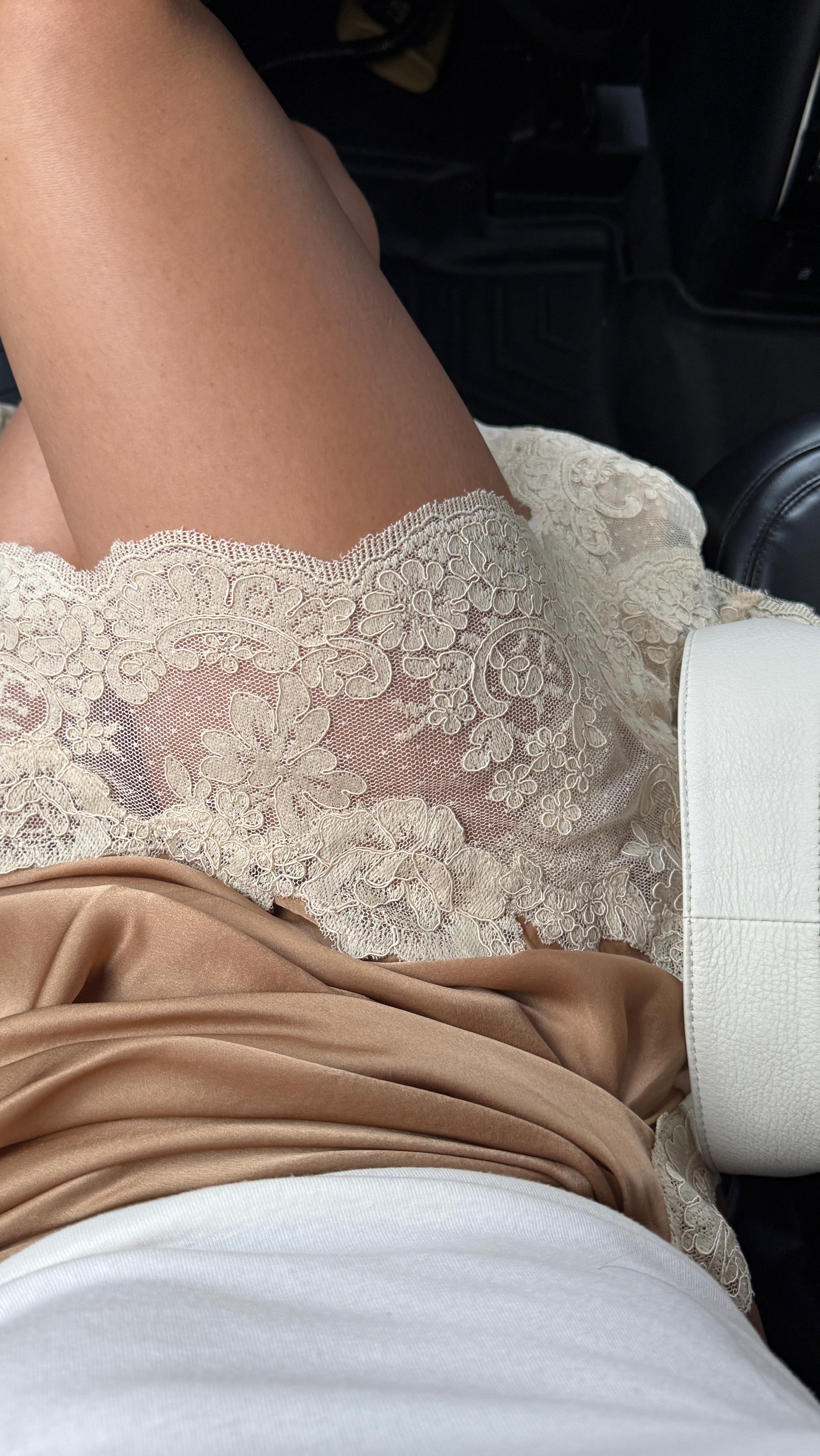 Fashion person Maggie Mcdonald wears a Zimmerman lace detail mini skirt. In the image you can see the toffee skirt and cream lace. This image was taken from her Instagram.