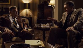 The Irishman Al Pacino and Robert DeNiro sitting in the living room, talking