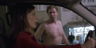 Old School Will Ferrell streaking alongside a van on main street