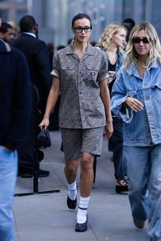 Irina Shayk attends the Michael Kors runway