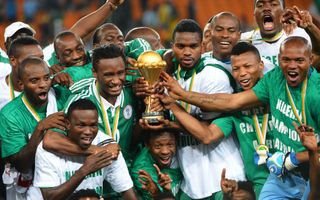 Nigeria players celebrate with the trophy after winning the Africa Cup of Nations in 2013.