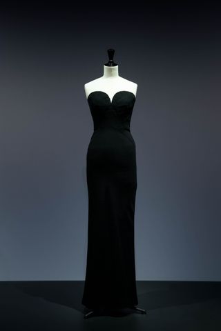 ‘Balenciaga in Black’ at Kunstmuseum Den Haag. A long black sleeveless evening dress on a mannequin.