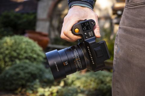 The Hasselblad X2D 100C camera in hand 