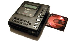 The Sony MZ1, the first MiniDisc player, with MiniDisc