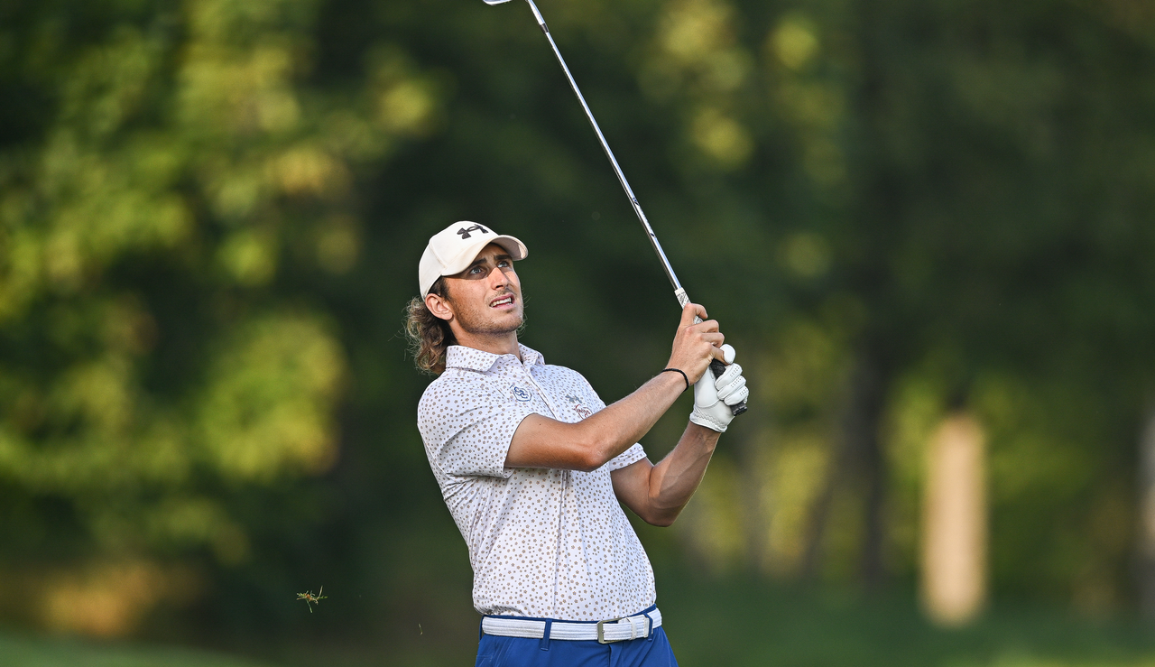 Cedric Gugler watches his approach shot