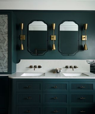 bathroom with dark green walls