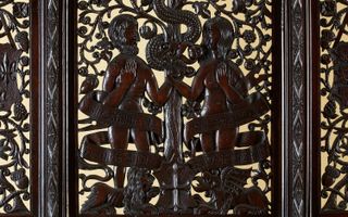 In a carved scene representing Adam and Eve, the figures' faces resemble those of King Henry VII and Elizabeth of York.