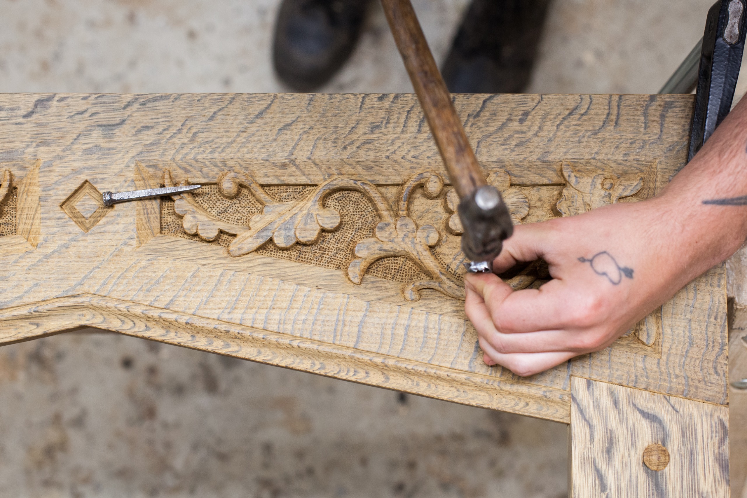 Close-up of a man wood carving