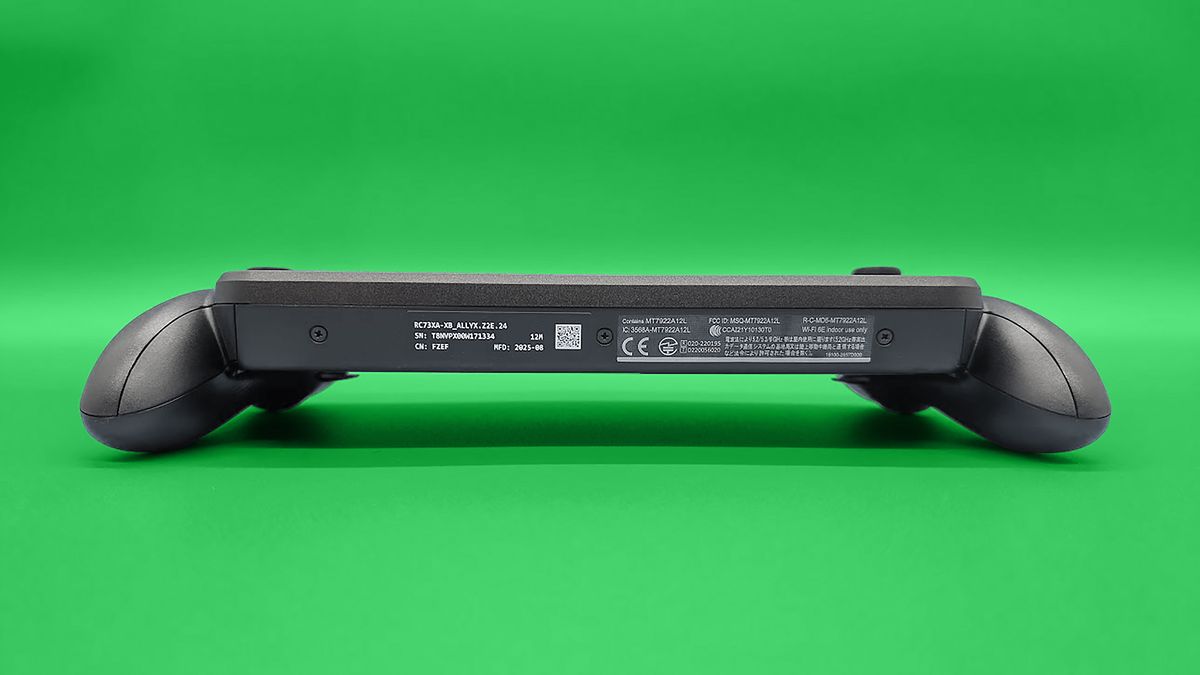 The ROG Xbox Ally X laying down with the bottom of the handheld visible.