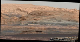 The dark band in the lower portion of this Martian scene is part of the "Bagnold Dunes" dune field lining the northwestern edge of Mount Sharp.