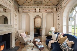 grand lounge in English folly with handpainted walls