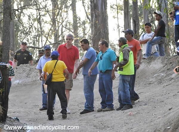 UCI Delegate Simon Burney talks to Guatemalan protesters blocking the track.