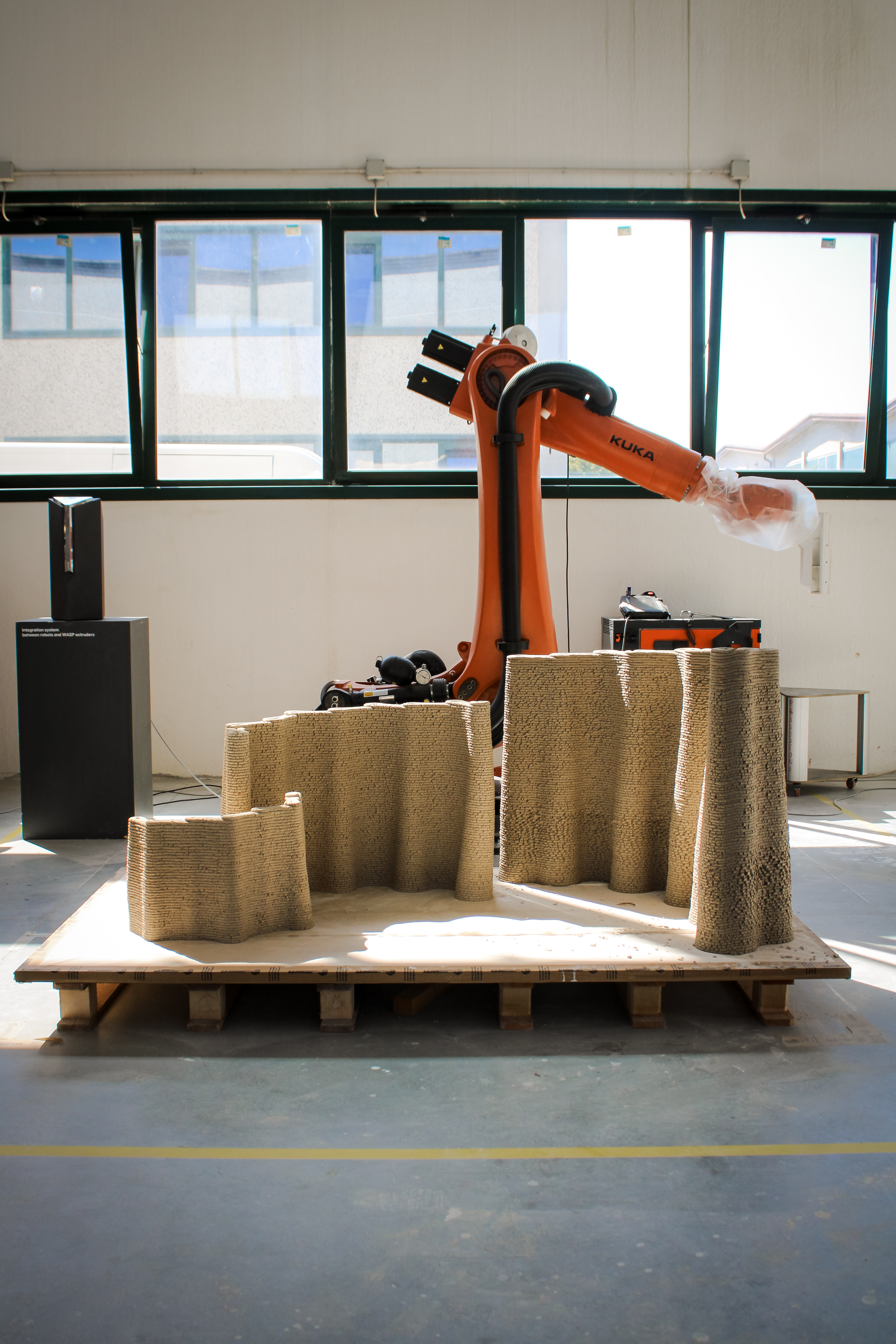 images of the production of Corncretl, a corn based bio alternative to concrete, which is 3D printed
