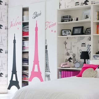 bedroom with white wardrobe and sliding door with stickers