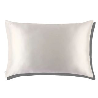 A white Slip Silk pillow on a white background