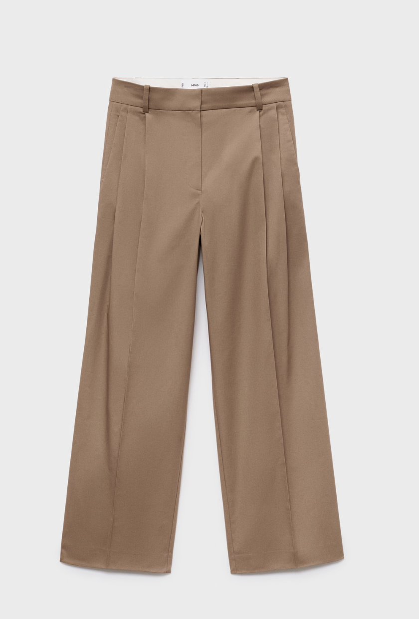 An image of Mango pleated trousers, a staple of preppy fashion. 