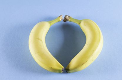 Two bananas in the shape of a heart
