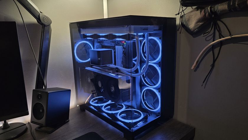 A gaming PC with RGB lighting enabled on a desk.