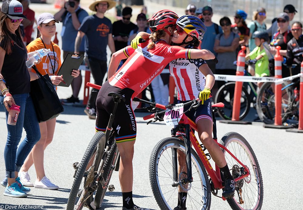 Specialized teammates Kate Courtney and Annika Langvad congratulate each other at the finish