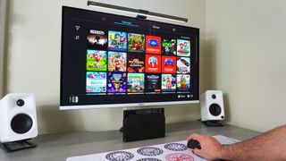 Using Mouse Mode on the Switch 2 on a desk with console docked and connected to a monitor