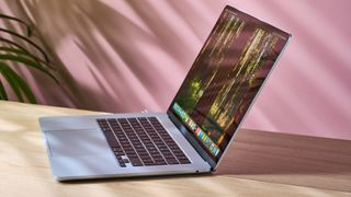 MacBook Air 15-inch with M4 chip on a creative's desk with screen open