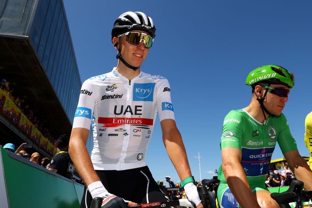 CALAIS FRANCE JULY 05 LR Tadej Pogacar of Slovenia and UAE Team Emirates white best young jersey and Fabio Jakobsen of Netherlands and QuickStep Alpha Vinyl Team Green Points Jersey prior to the 109th Tour de France 2022 Stage 4 a 1715km stage from Dunkerque to Calais TDF2022 WorldTour on July 05 2022 in Calais France Photo by Michael SteeleGetty Images