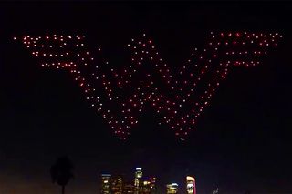 "Look, up in the sky!" No, it's neither a bird nor a plane — it's hundreds of drones forming the "Wonder Woman" logo.