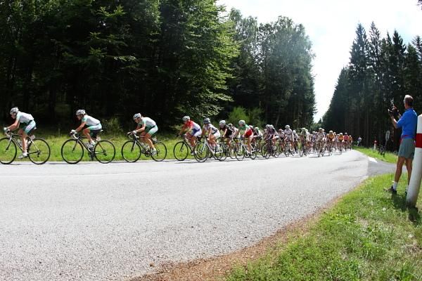 At the summit of the first climb, the bunch were strung out in a line