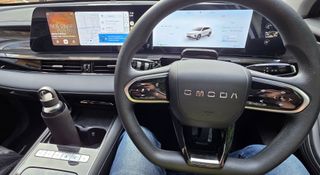 The Chery Omoda E5 BX's interior, showing its instrument cluster and infotainment system