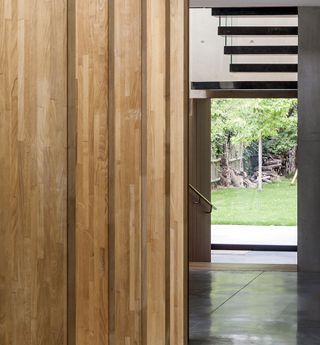 house entrance with timber furniture
