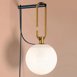 A hanging globe wall light