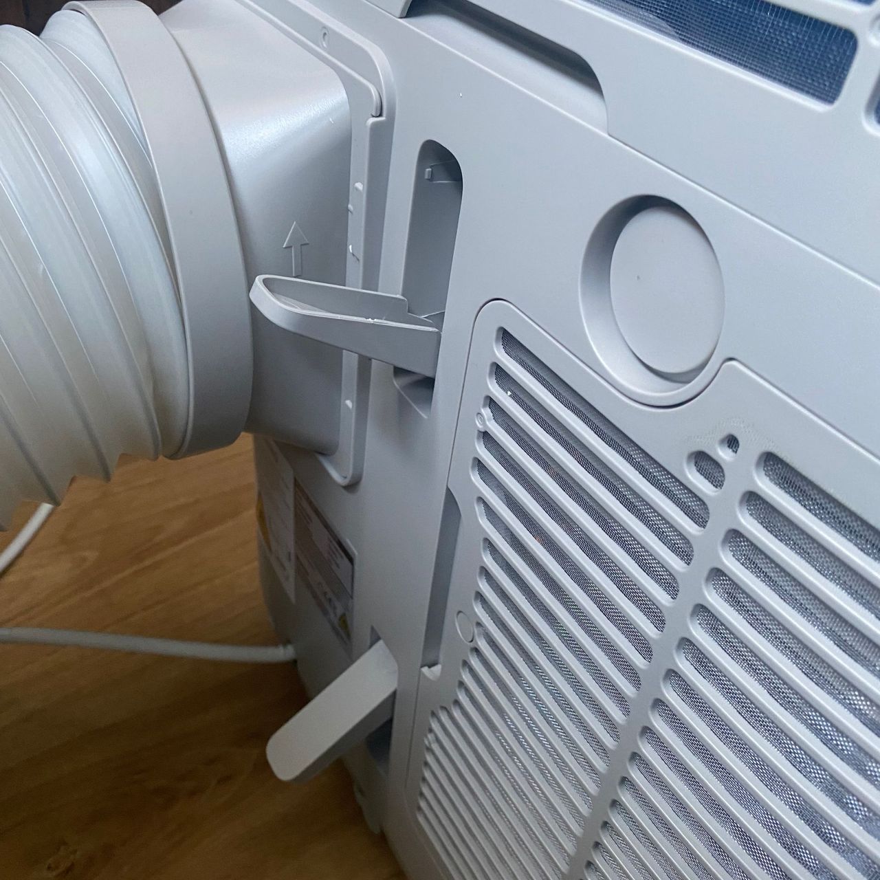 Cable tidy and connected exhaust hose on the back of the Meaco Cirro portable air conditioner