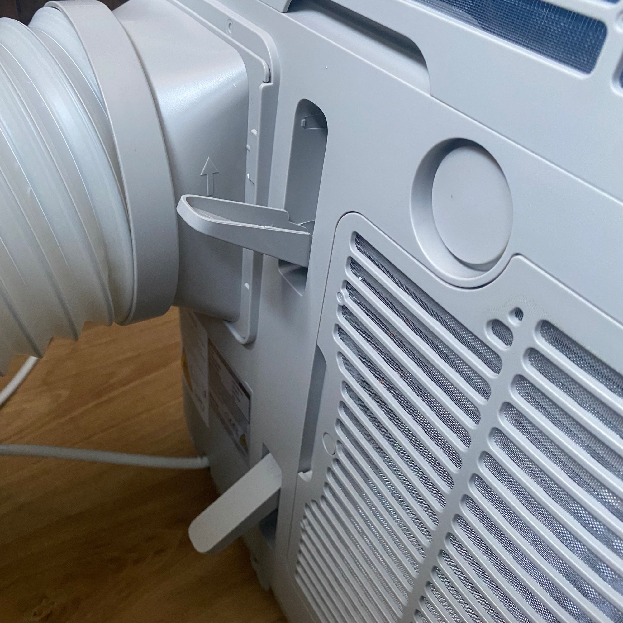 Cable tidy and connected exhaust hose on the back of the Meaco Cirro portable air conditioner