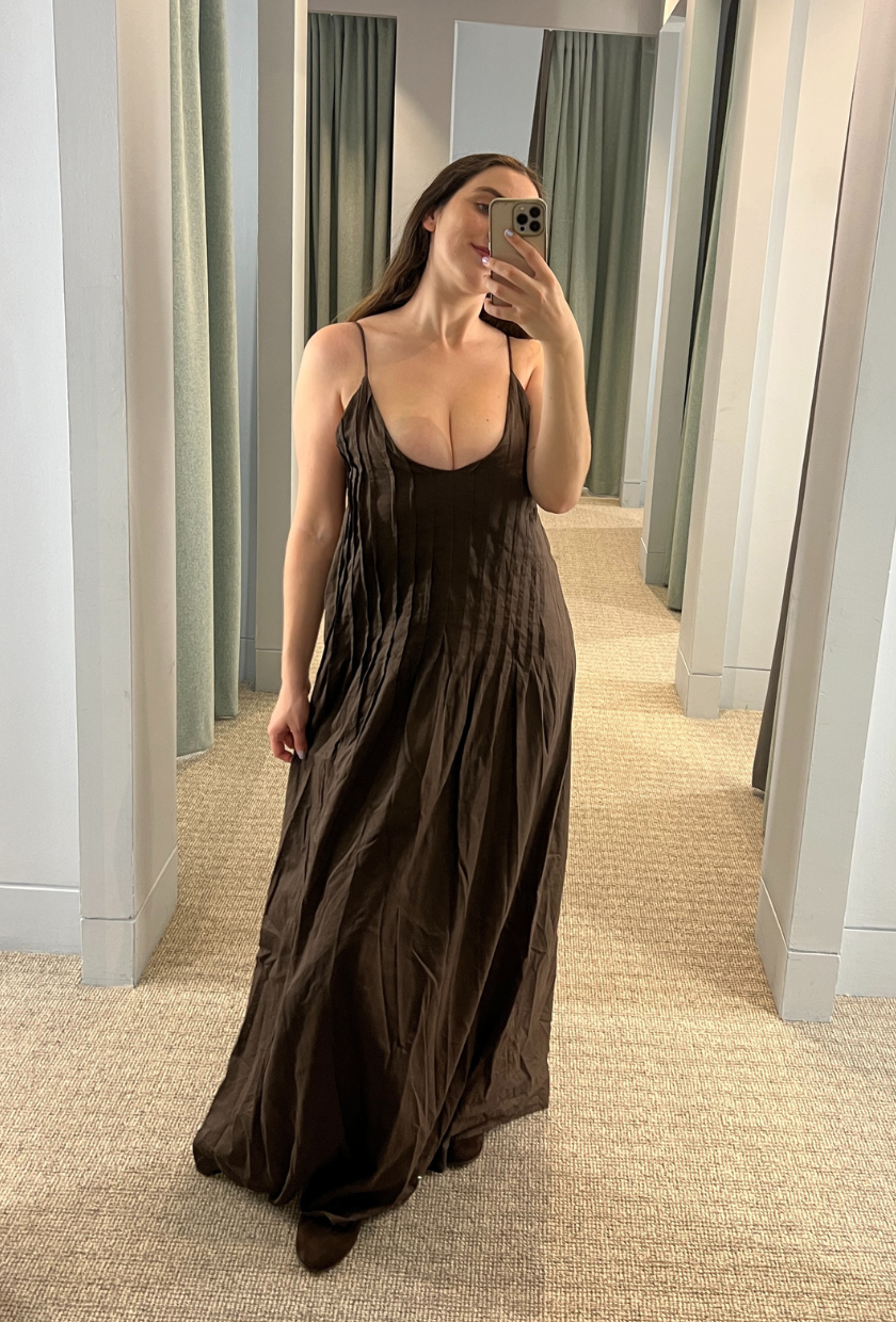 An image of Who What Wear UK's Ava Gilchrist wearing one of the best DISSH dresses.