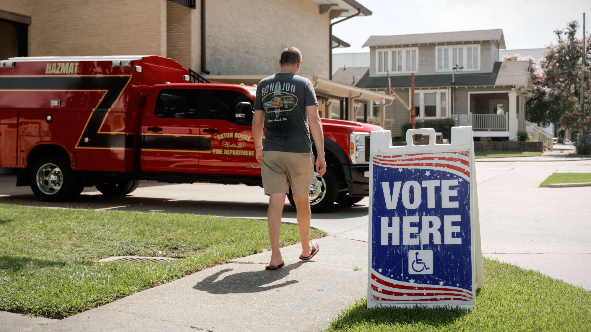 "Vote Here" signage outside a polling location at Fire Station 12 during a runoff primary election in downtown Baton Rouge, Louisiana