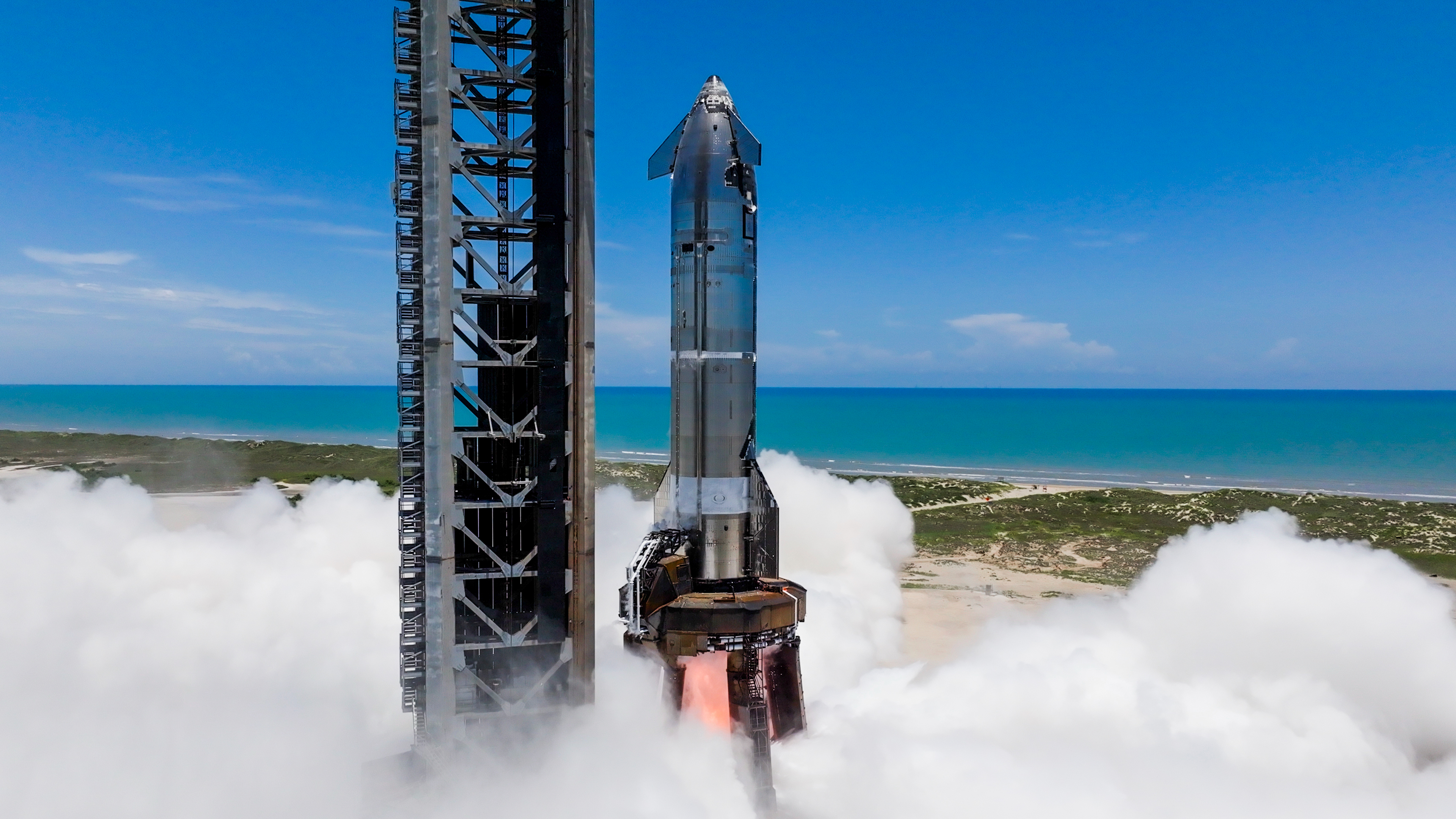 SpaceX conducts a static fire test with a Starship upper stage at its Starbase site in South Texas on July 31, 2025.