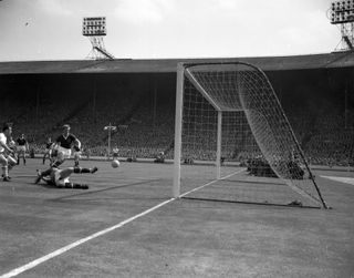 Nat Lofthouse, left, scores in the 1958 FA Cup final