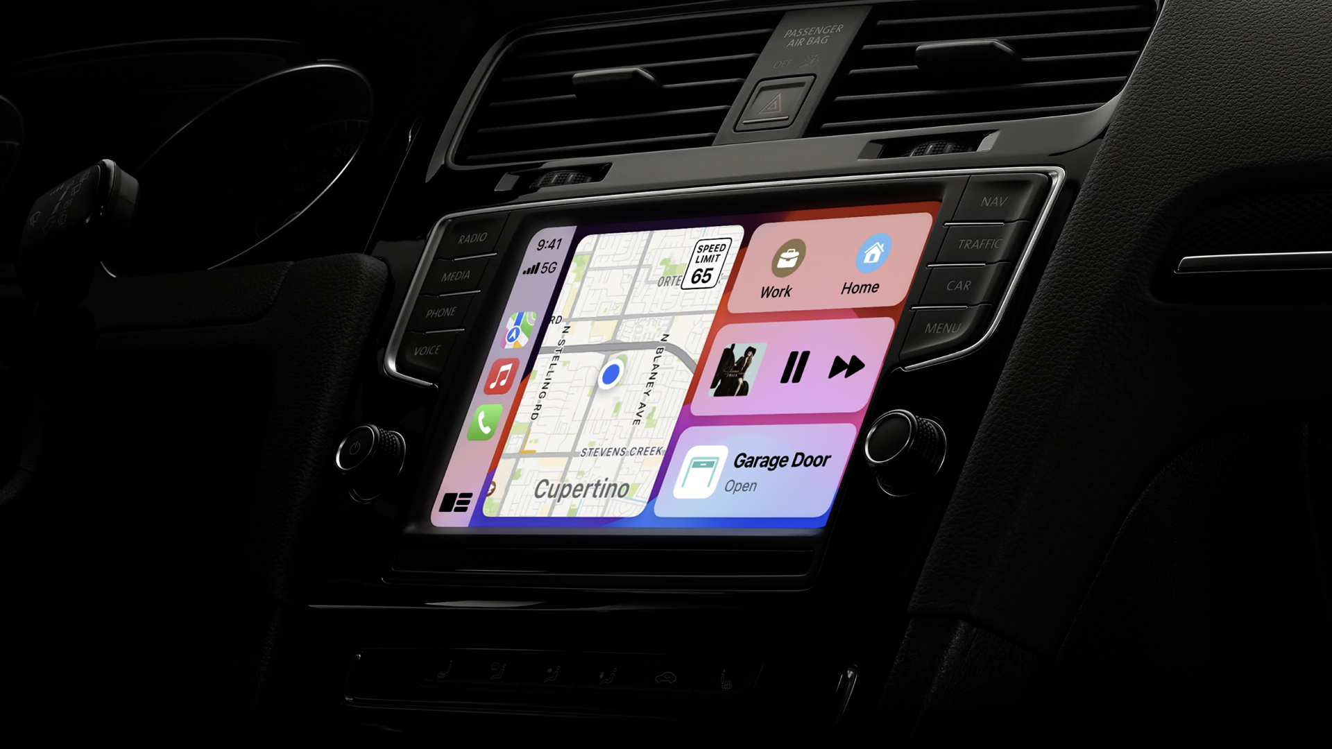 Apple CarPlay running on an in-car infotainment screen – the car is dark so only the screen is lit